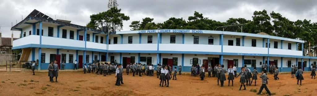 Lissi Pearl Higher Secondary School campus and students in the courtyard